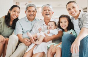 Happy family with grandparents and young child supported by bulk billing GP services in Forest Lake