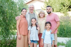 Multigenerational family with grandparents, parents, and children smiling together at Forest Lake Family Practice